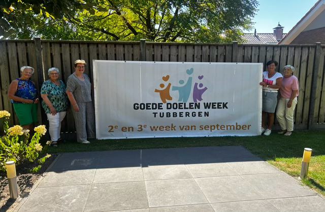 Het team bij een GDW Tubbergen banner